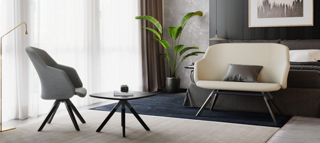 Hotel room featuring the Junea Sofa, Chair and the A-Cros Table